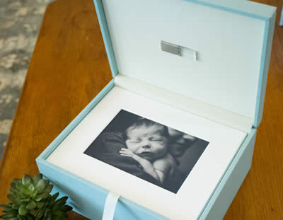 Combine digital files with matted prints in a folio box