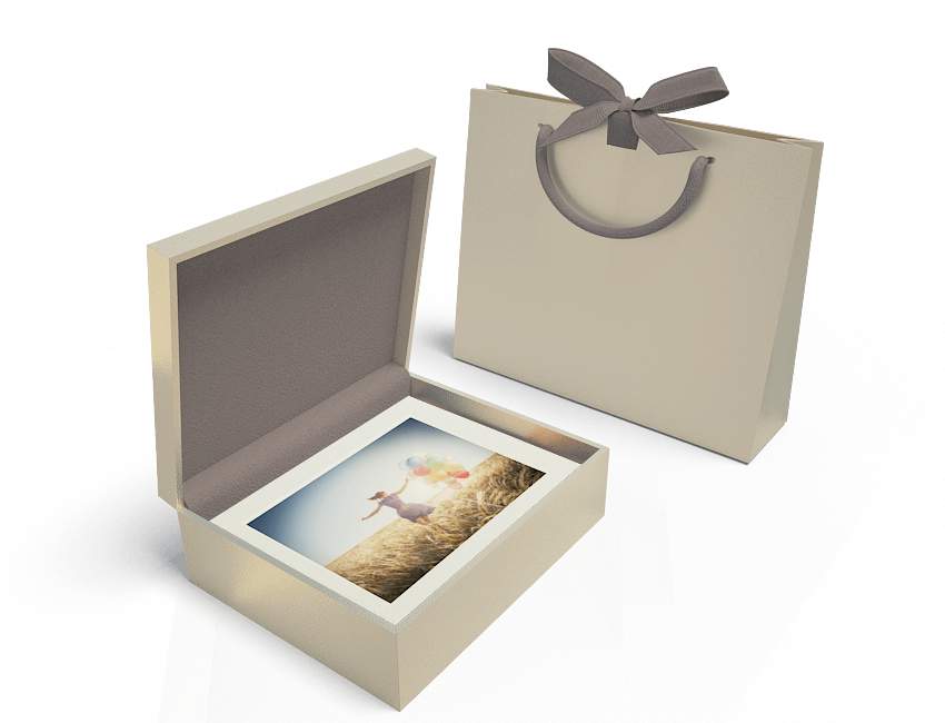 18 ivory matted prints with champagne box and bag